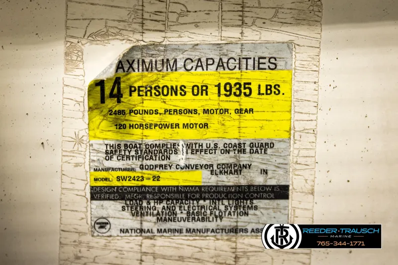 Slide: The Image of Boat capacity label for Godfrey SW2423, 1998 model, 14 persons or 1935 lbs. - 41