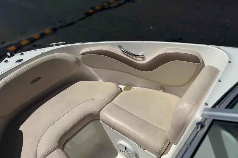 Slide: The Image of 2006 Chaparral 190 SSi boat interior with beige seating and sleek design. - 14