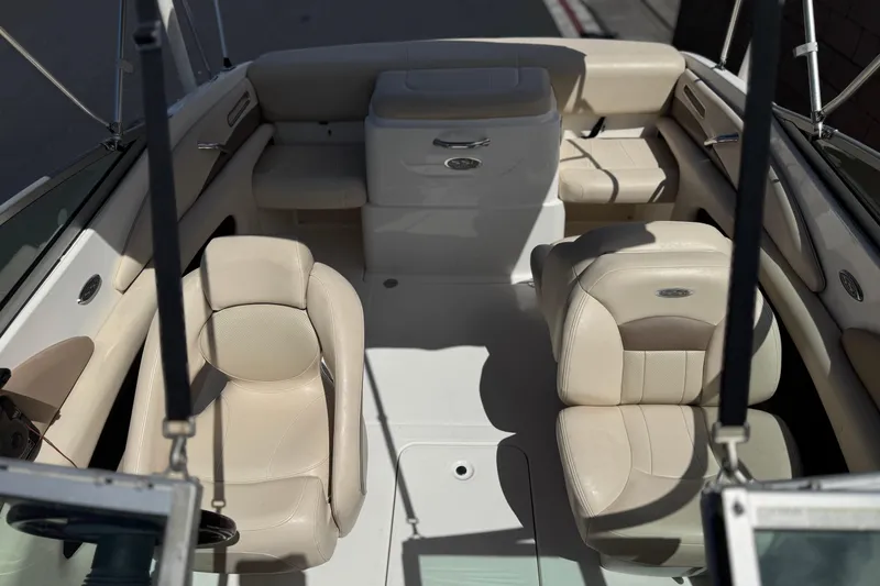Slide: The Image of Interior of a 2006 Chaparral 190 SSi boat with beige seating. - 15