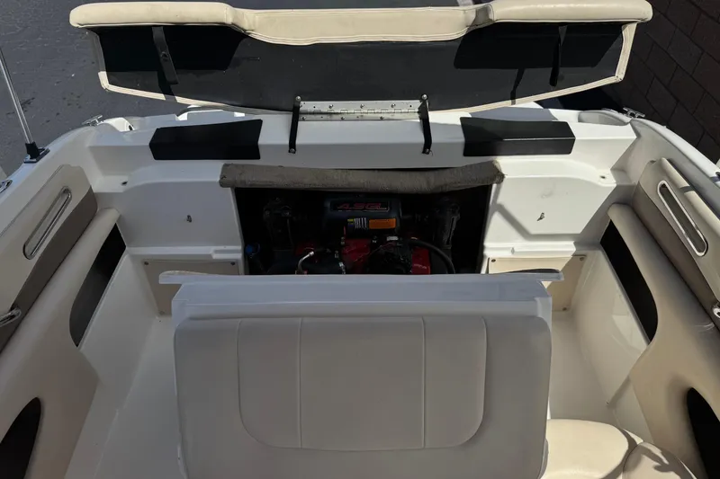 Slide: The Image of 2006 Chaparral 190 SSi boat interior with open engine compartment. - 17