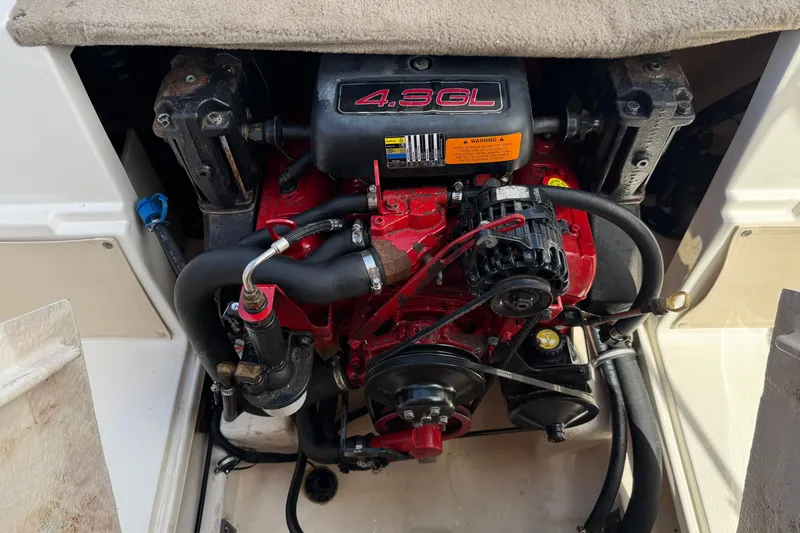 Slide: The Image of Engine compartment of a 2006 Chaparral 190 SSi boat, featuring a 4.3GL engine. - 18