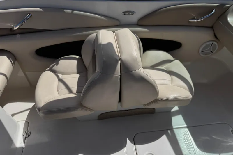 Slide: The Image of 2006 Chaparral 190 SSi boat interior with beige seating and sleek design. - 19