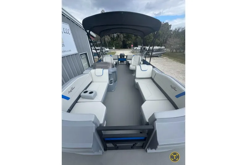 Slide: The Image of 2026 SunChaser Lucerne 20 LR DH pontoon boat with spacious seating and canopy. - 3