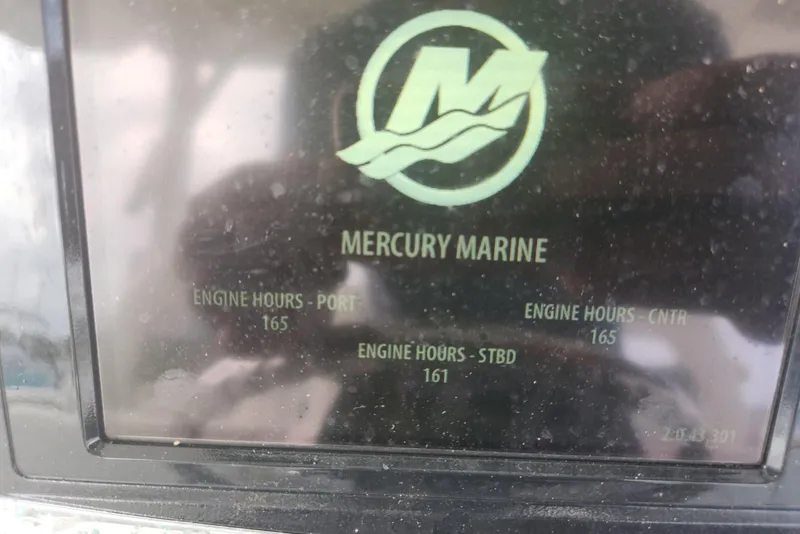 Slide: The Image of Display screen showing Mercury Marine engine hours for Boston Whaler 350 Outrage, 2014 model. - 33
