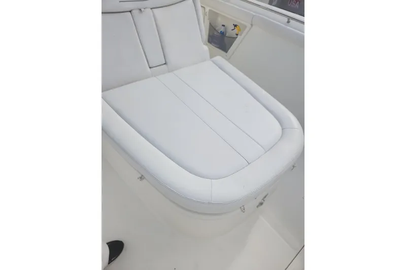 Slide: The Image of White cushioned seating on 2014 Boston Whaler 350 Outrage boat. - 37