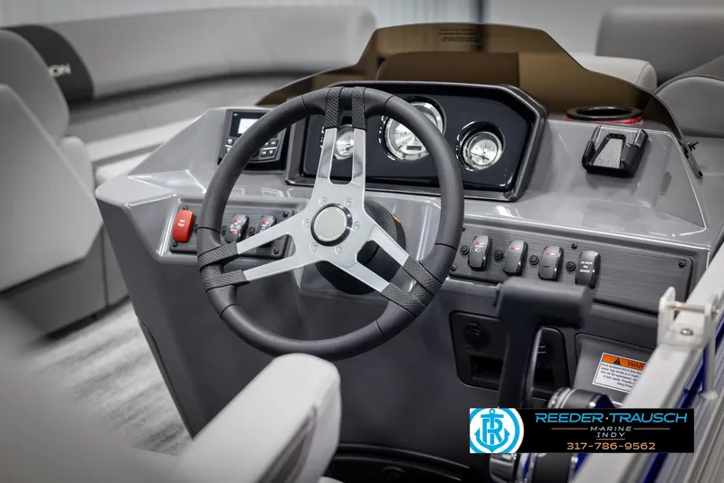Slide: The Image of 2025 Bennington 21 SSR steering console with modern controls. - 29