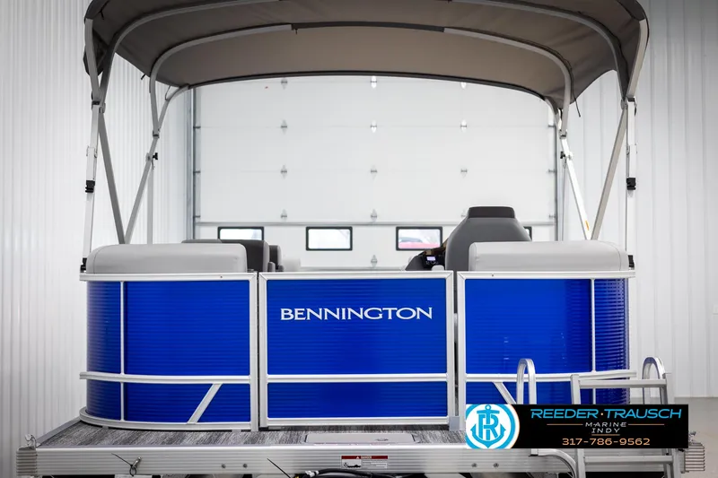 Slide: The Image of Bennington 21 SSR 2025 pontoon boat in a storage facility. - 8
