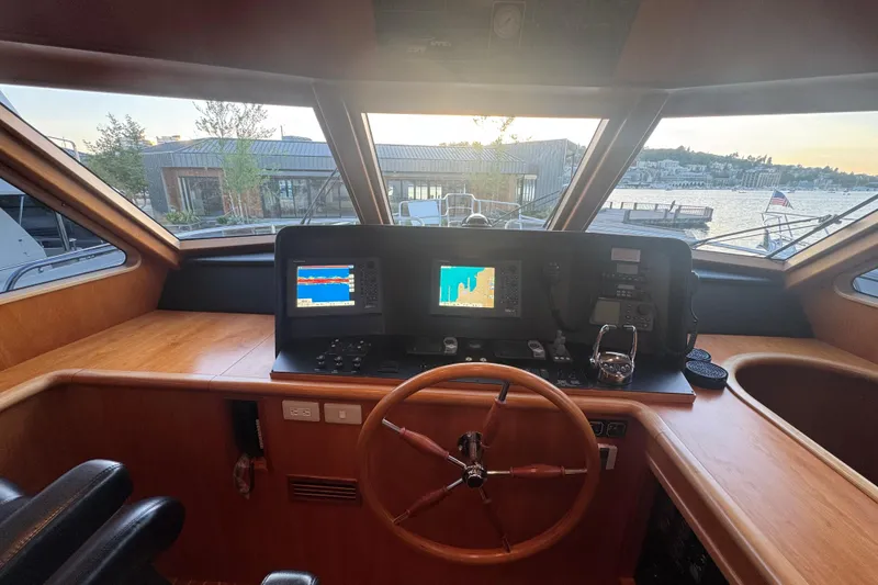 Slide: The Image of Pilothouse interior of 2007 Symbol 59' Pilothouse Classic yacht with navigation equipment. - 23