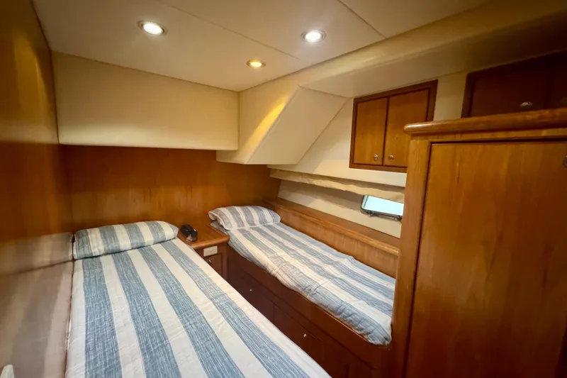 Slide: The Image of Cozy twin cabin in 2007 Symbol 59' Pilothouse Classic yacht with wood paneling. - 31