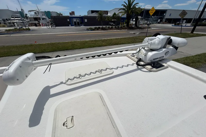Slide: The Image of 2021 Mako Pro Skiff 19 CC with Minn Kota trolling motor on deck. - 15