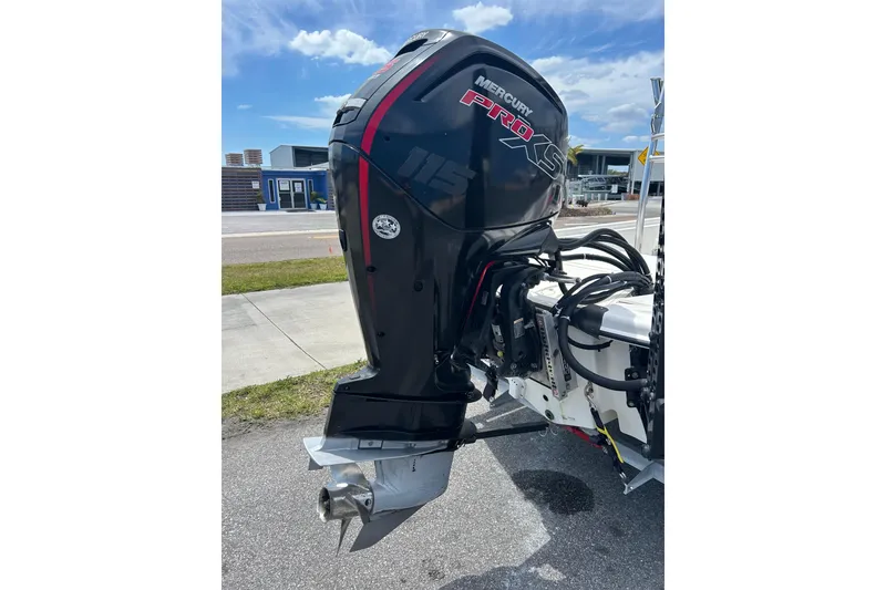 Slide: The Image of 2021 Mako Pro Skiff 19 CC with Mercury Pro XS outboard motor. - 4