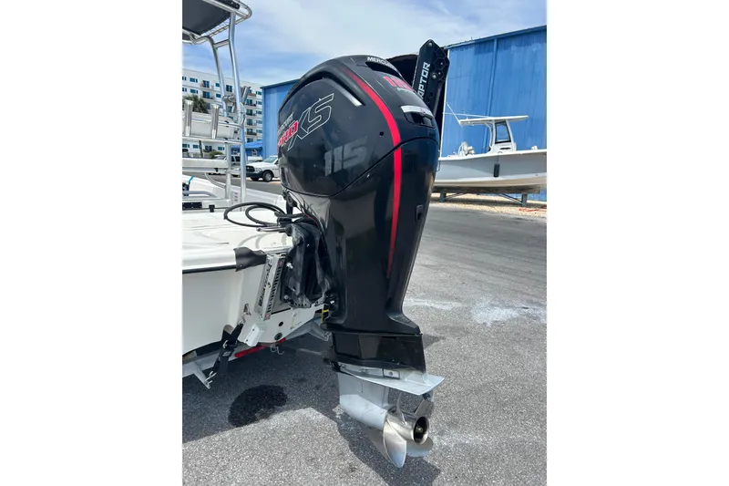 Slide: The Image of 2021 Mako Pro Skiff 19 CC with Mercury Pro XS outboard motor. - 5