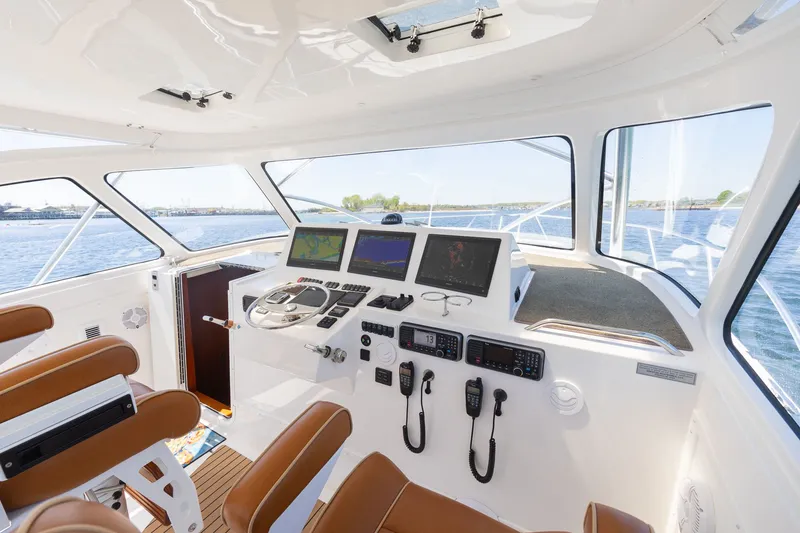 Slide: The Image of Interior of 2022 Albemarle 36 Express yacht with modern helm console. - 11