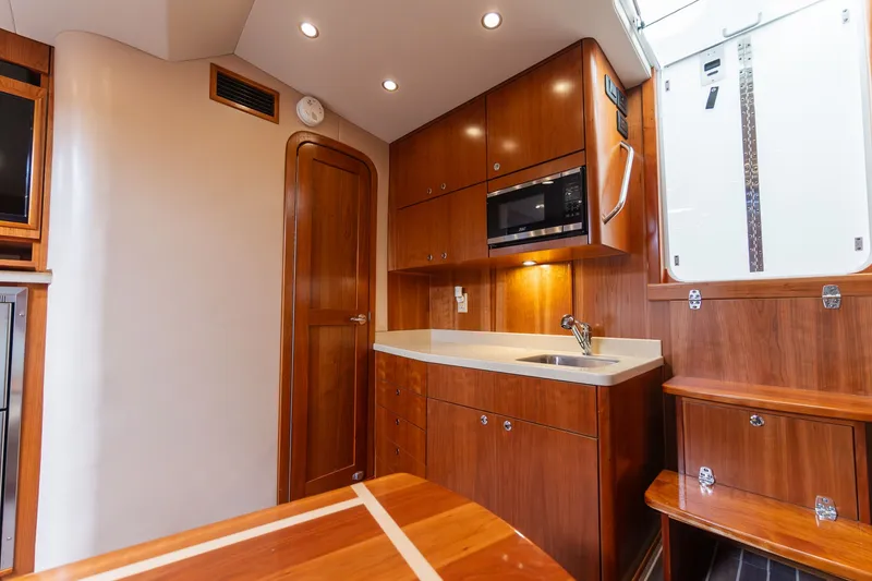 Slide: The Image of Interior of 2022 Albemarle 36 Express featuring modern kitchen. - 35