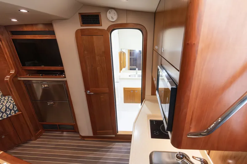 Slide: The Image of Interior of 2022 Albemarle 36 Express featuring modern kitchen. - 36