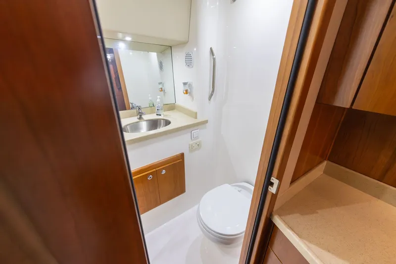 Slide: The Image of Interior of Albemarle 36 Express 2022 featuring bathroom and sink. - 37