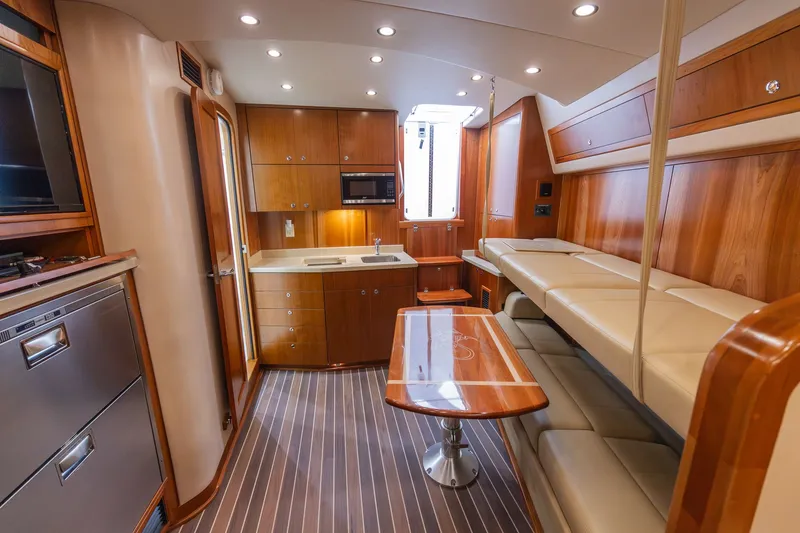 Slide: The Image of Interior of 2022 Albemarle 36 Express with modern kitchen and seating area. - 44