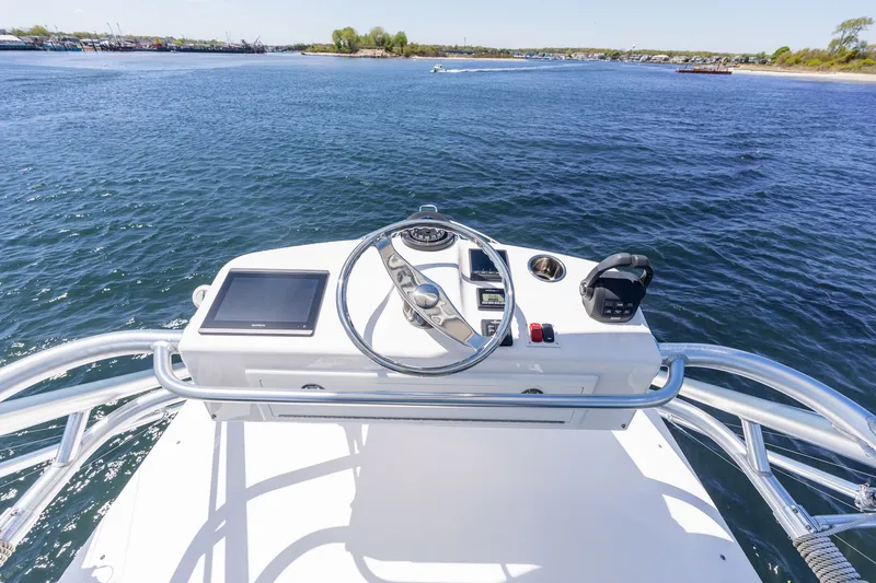 Slide: The Image of Helm of Albemarle 36 Express 2022 on open water. - 46
