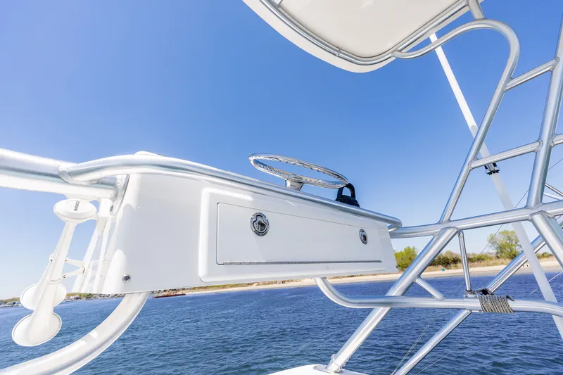 Slide: The Image of Albemarle 36 Express 2022 helm station with blue sky. - 48