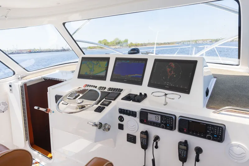 Slide: The Image of Albemarle 36 Express 2022 helm with modern electronics. - 8