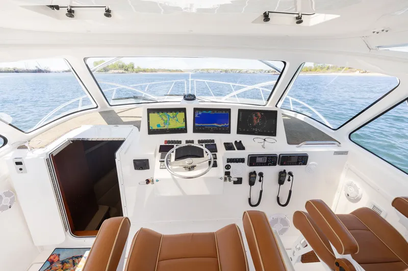 Slide: The Image of Interior of 2022 Albemarle 36 Express with modern helm console. - 9