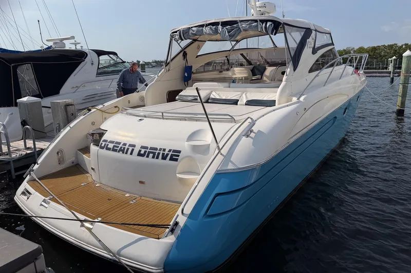 The Image of 2003 Viking Princess V50 yacht docked, featuring sleek design and spacious deck area. - 0