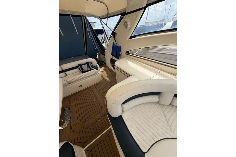 Slide: The Image of Interior of 2003 Viking Princess V50 yacht with elegant seating and wooden flooring. - 20