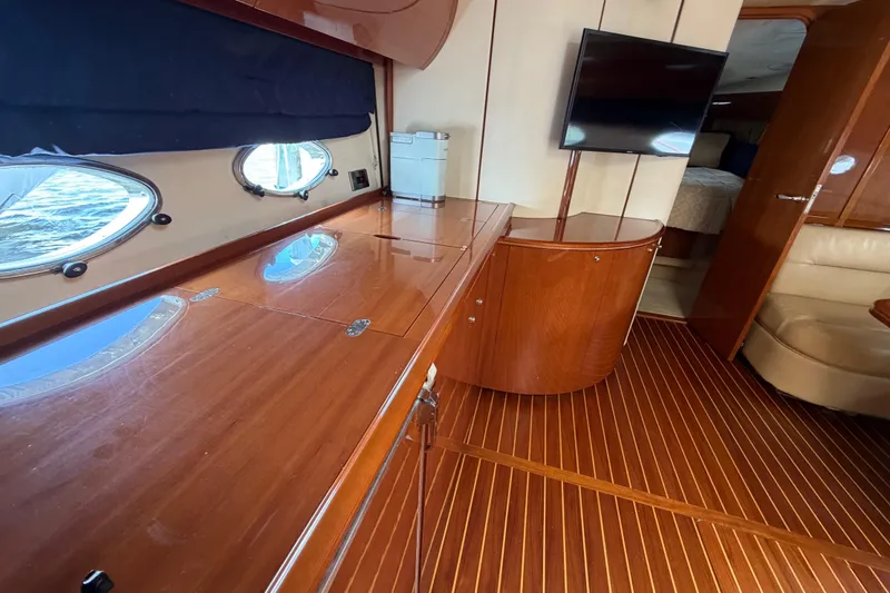 Slide: The Image of Luxurious interior of 2003 Viking Princess V50 yacht with polished wood and modern amenities. - 6