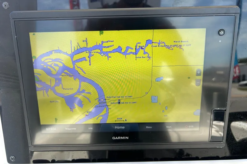 Slide: The Image of Garmin GPS display on 2021 Sea Hunt Ultra 234 boat showing nautical map. - 18