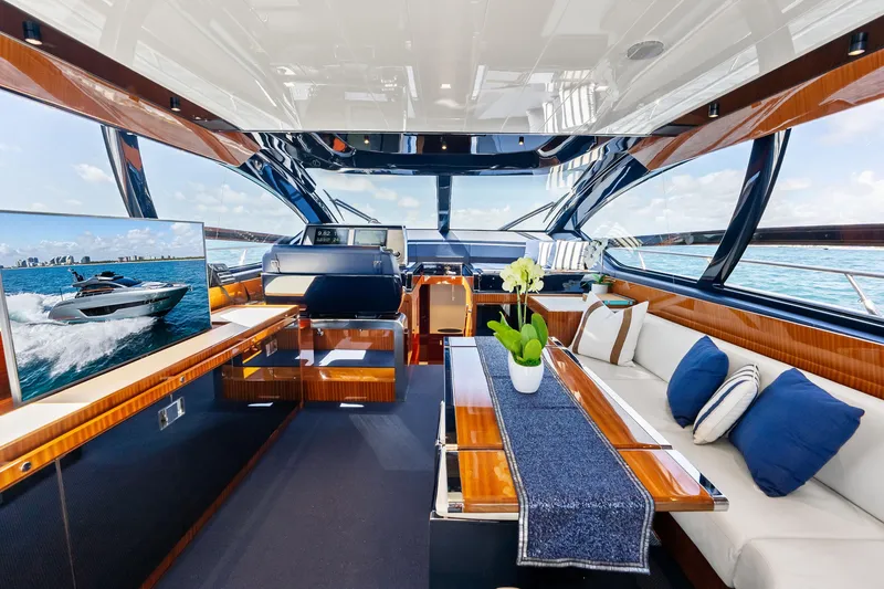 Slide: The Image of Luxurious interior of 2021 Riva 66' Ribelle yacht with elegant seating and decor. - 11