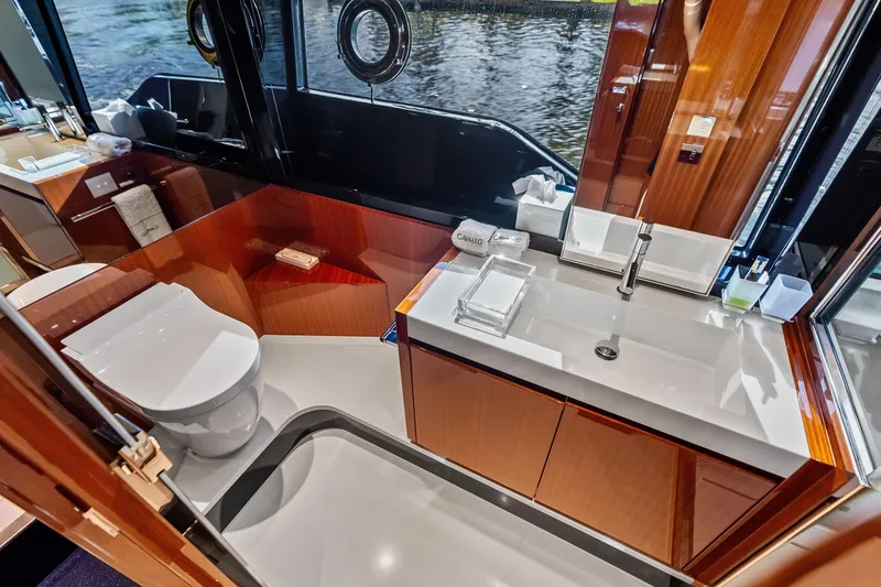 Slide: The Image of Luxurious bathroom interior of 2021 Riva 66' Ribelle yacht with modern fixtures. - 18