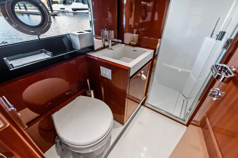 Slide: The Image of Luxurious bathroom interior of 2021 Riva 66' Ribelle yacht with modern fixtures. - 21