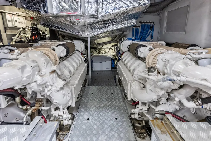 Slide: The Image of Engine room of 2021 Riva 66' Ribelle yacht, showcasing dual powerful engines. - 24