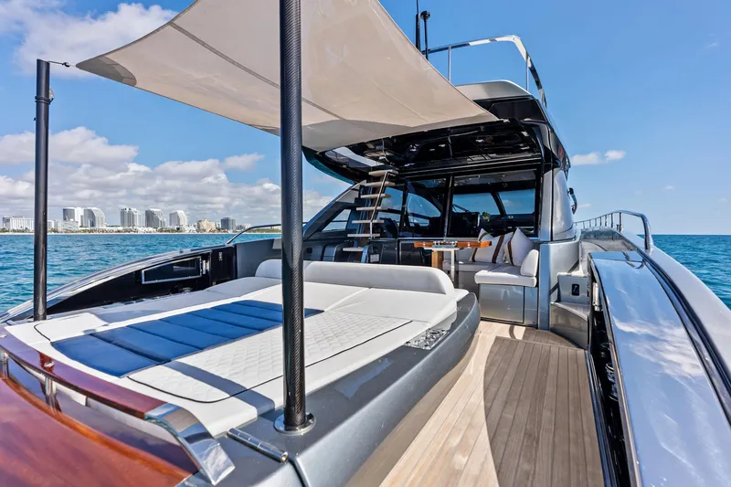 Slide: The Image of Luxurious 2021 Riva 66' Ribelle yacht with sun deck and ocean view. - 4