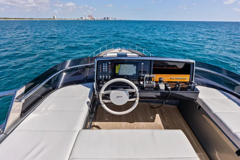 Slide: The Image of Cockpit view of 2021 Riva 66' Ribelle yacht on open sea. - 8