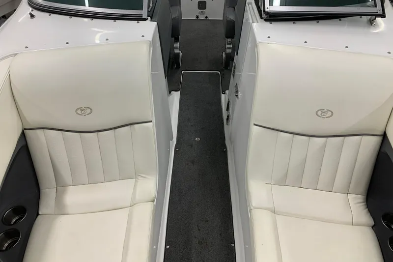 Slide: The Image of Interior of a 2007 Cobalt 262 boat with white leather seating. - 24
