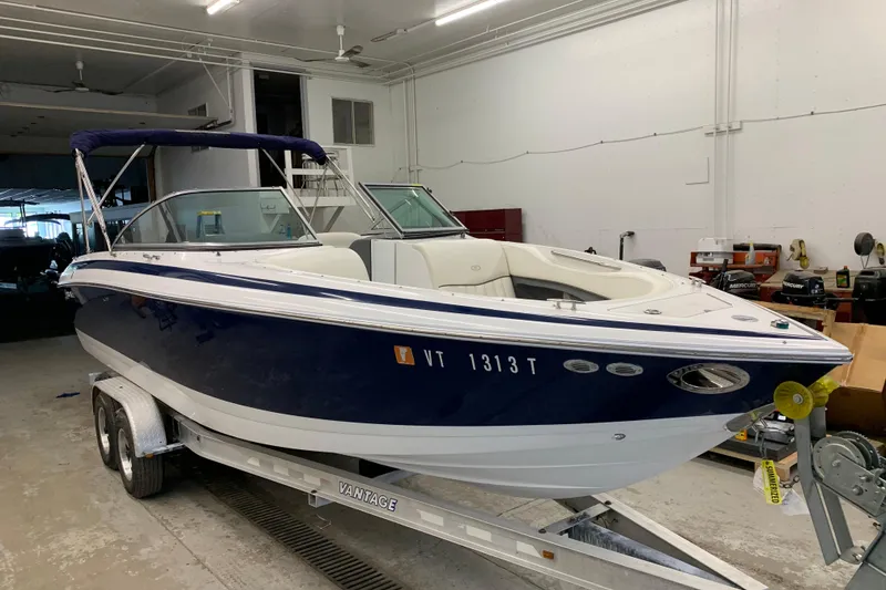 Slide: The Image of 2007 Cobalt 262 boat on trailer in indoor storage facility. - 28