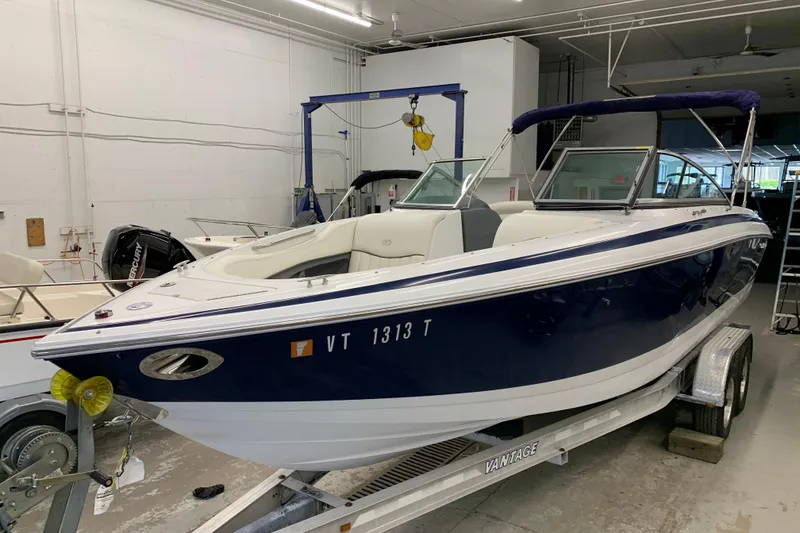 Slide: The Image of 2007 Cobalt 262 boat on trailer in indoor storage facility. - 29
