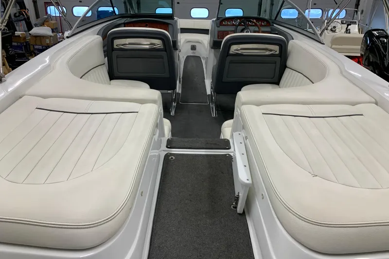 Slide: The Image of Interior of a 2007 Cobalt 262 boat with white leather seating. - 3