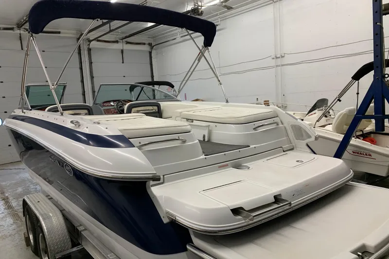 Slide: The Image of 2007 Cobalt 262 boat with canopy in indoor storage on trailer. - 33