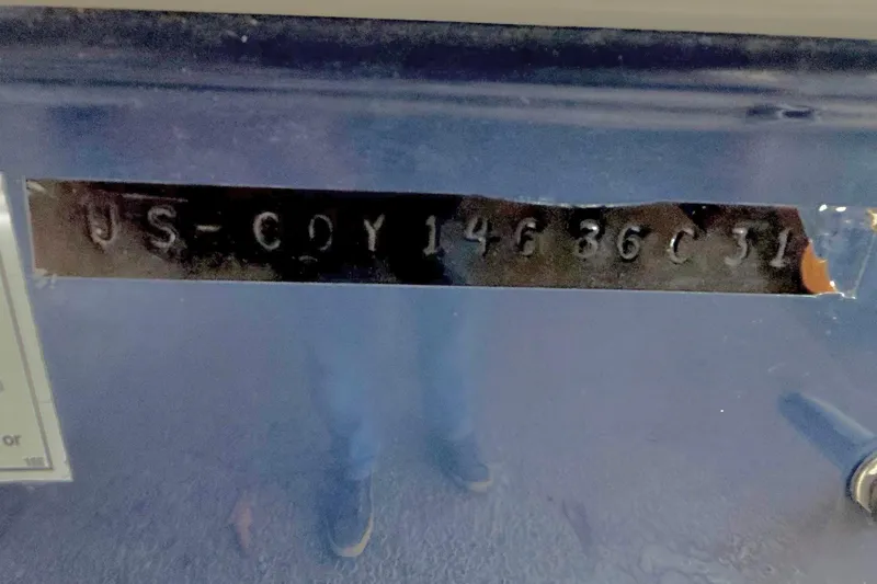 Slide: The Image of 2013 Hurricane SunDeck Sport 201 OB boat hull identification number (HIN) close-up. - 11