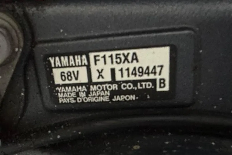 Slide: The Image of Yamaha F115XA engine label on 2013 Hurricane SunDeck Sport 201 OB boat. - 12