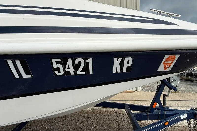 Slide: The Image of 2013 Hurricane SunDeck Sport 201 OB boat on trailer, registration IL 5421 KP. - 2
