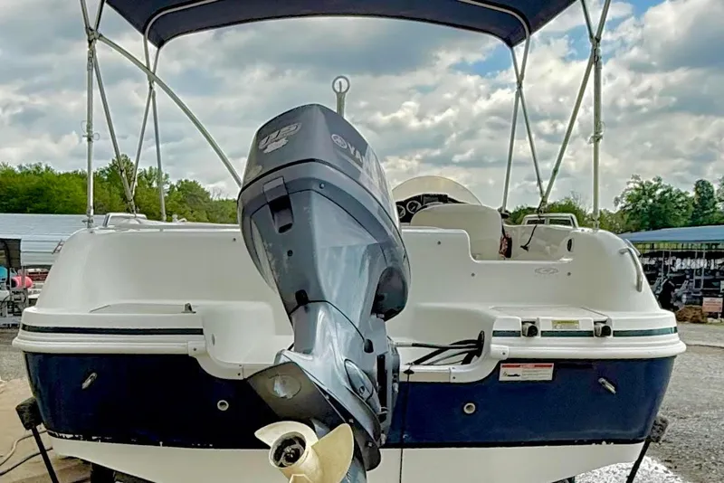 Slide: The Image of 2013 Hurricane SunDeck Sport 201 OB boat with Yamaha outboard motor. - 3