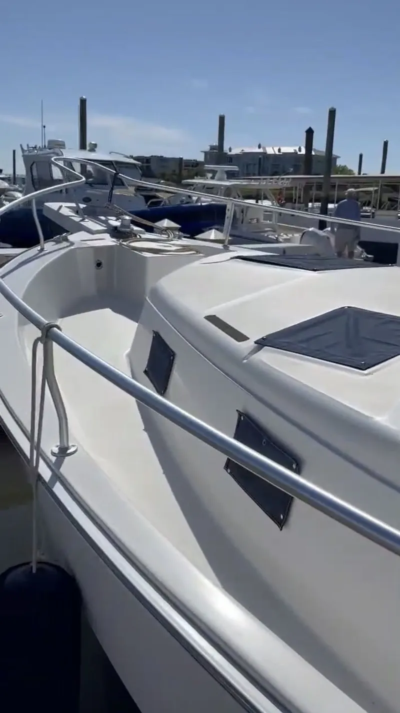 Slide: The Image of 2001 Mainship 390 Trawler docked, side view. - 18