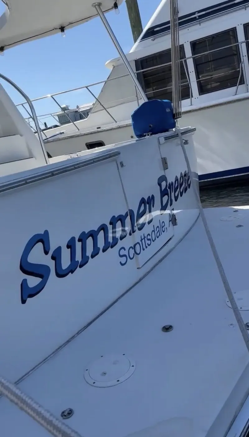 Slide: The Image of 2001 Mainship 390 Trawler with "Summer Breeze" lettering on the stern. - 22