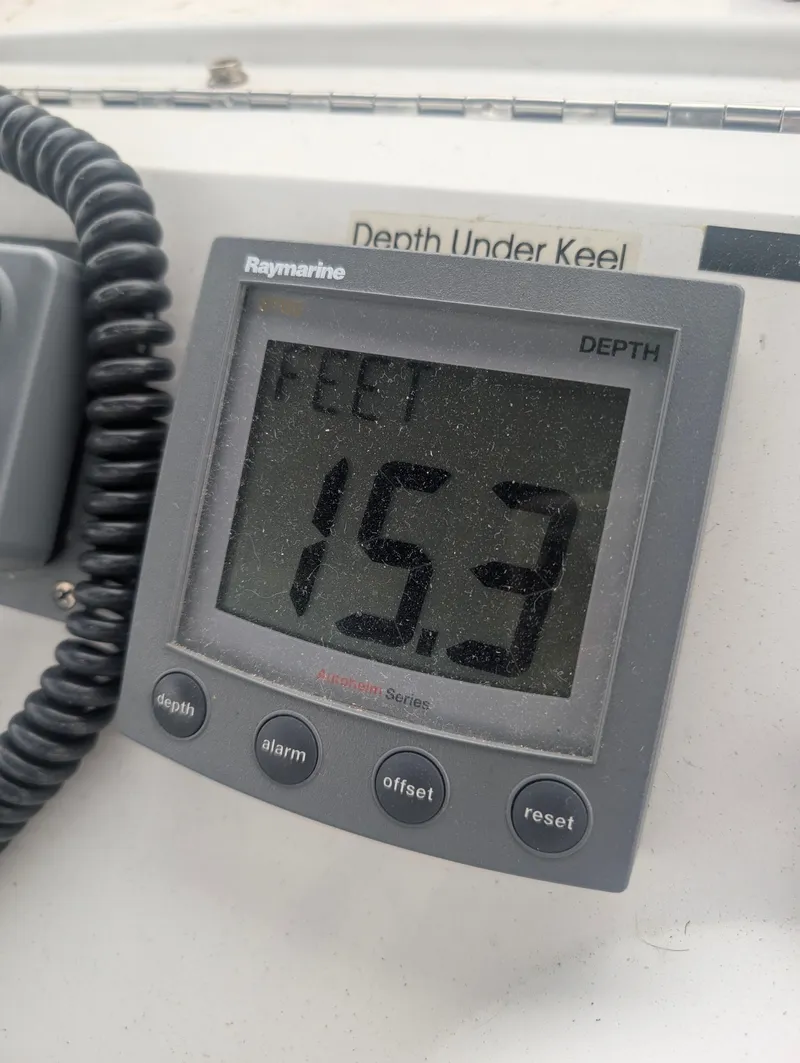 Slide: The Image of Raymarine depth gauge showing 15.3 feet on Mainship 390 Trawler. - 28