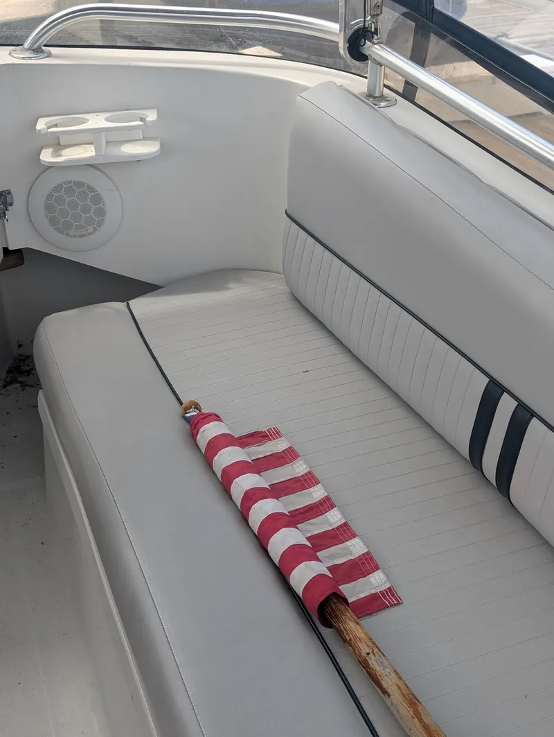 Slide: The Image of Interior of a 2001 Mainship 390 Trawler with striped flag. - 66