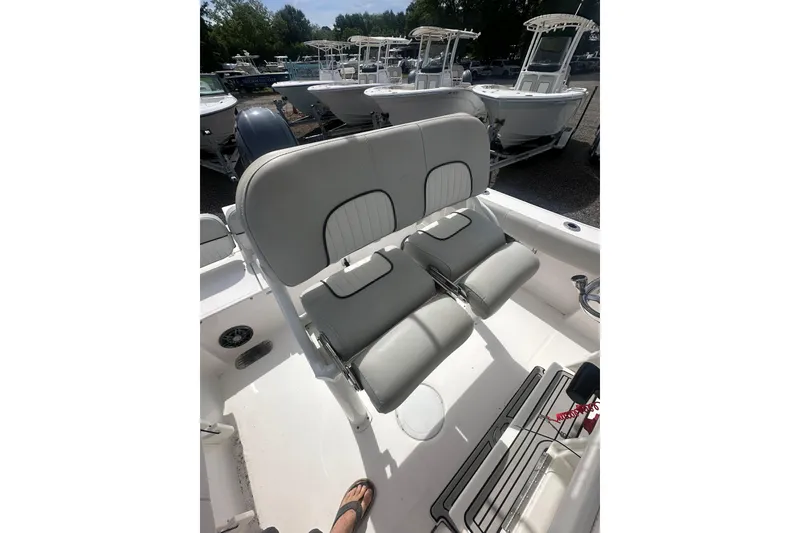 Slide: The Image of 2023 Sea Fox 228 Commander boat interior with dual seating and helm. - 13