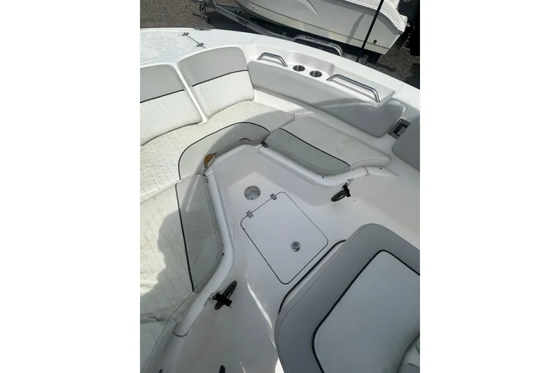 Slide: The Image of 2023 Sea Fox 228 Commander boat interior with cushioned seating and storage compartments. - 15